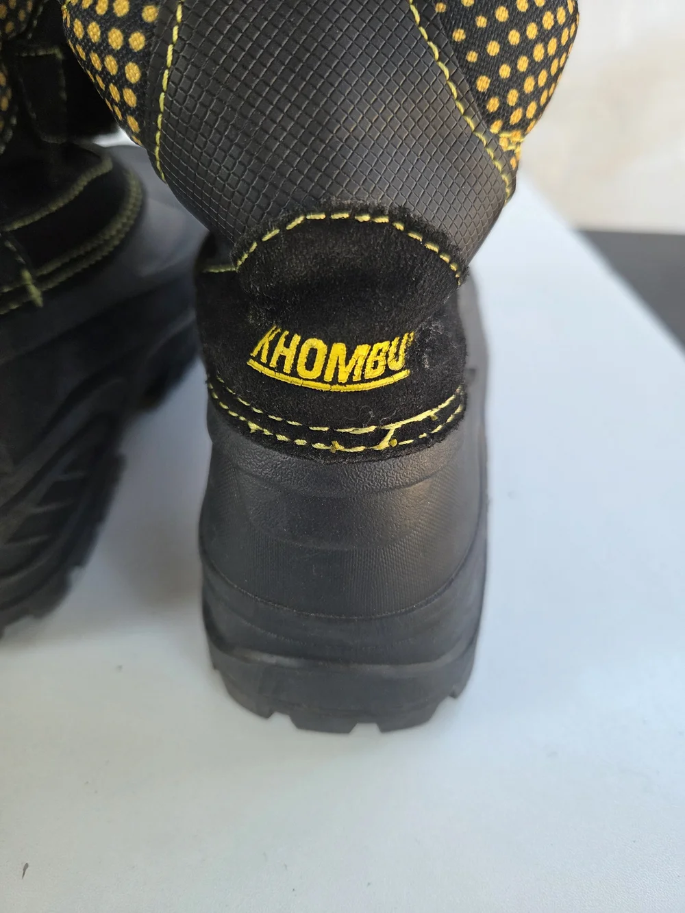 Khombu Kids Black Snow Boots with Yellow Stitching